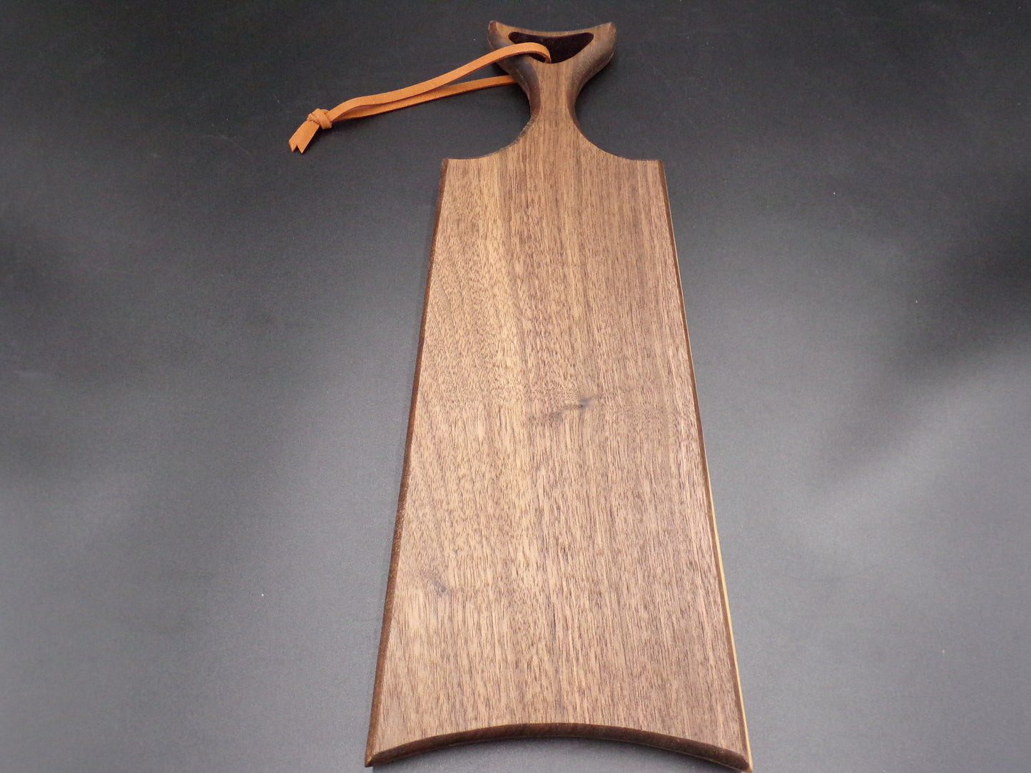 Embrace Faith and Flavor with Our Personalized Walnut Fishtail Paddle Charcuterie Bread Board